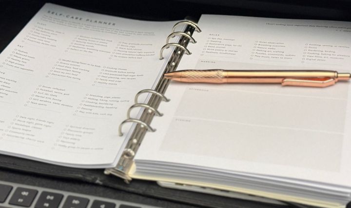 Full Focus Wellness Planner open to the Self-Care Planner page, a simple tool for burnout recovery